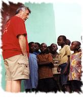 George with Ugandan Children